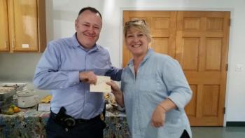 Camden Police Detective Curt Andrick is another winner in the raffle. (Photo by Sarah Shepherd)