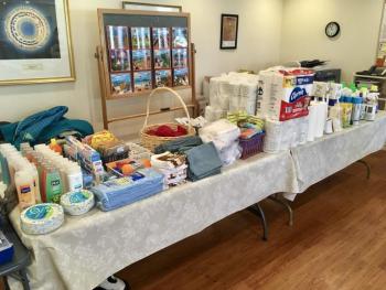 Collecting items to assemble Welcome Home Kits. (Photo courtesy of Elizabeth Siegel)