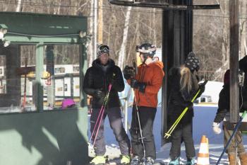 Glen Plake, Andre LeBlond and Kimberly Plake wait for the chair. (Photo courtesy Camden Snow Bowl/by John Steele)