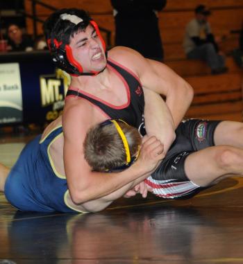 Drew Kelly pinning a Mount Blue wrestler. (Courtesy Glenn Lang)