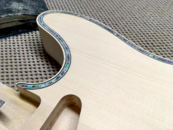 A Northwoods guitar undergoes a final sanding during the guitar making process. (Courtesy Thad Chilton)