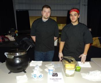Gary Frost (left) and Dakota Walker (right) represented Front Street Pub and said their chili has a lot of organic ingredients, as well as stout beer. Frost said most of the ingredients were purchased at the Belfast Co-op. (photo by Erica Thoms)