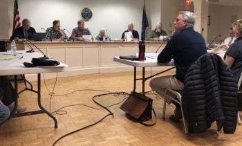 Rockport’s Select Board met with the town’s Budget Committee, as well as engineer Will Gartley and Rockport’s representatives of the new library construction project Feb. 26 at the Rockport Opera House. At the podium: Town Manager Rick Bates, Rockport Select Board member Doug Cole, Chairman Ken McKinley, and members Deb Hall, Jeff Hamilton and Mark Kelley. (Photo by Lynda Clancy)