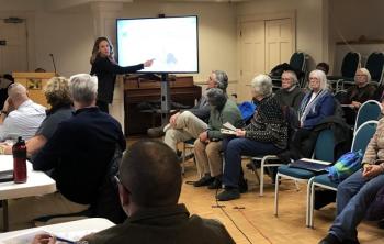 Rockport resident Jen Porter asks questions about the parking plans on Limerock Street in Rockport Village at a meeting of the town’s select board and budget committee, as well as interested citizens. (Photo by Lynda Clancy)