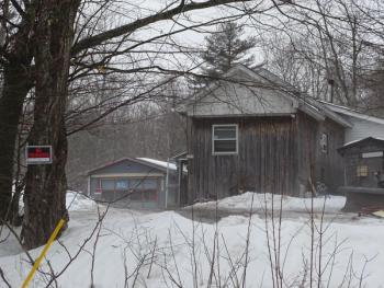 Maine State Police and Waldo County Sheriff’s Office members remained on scene as of 4:00 p.m. Friday afternoon. (photo by Erica Thoms)