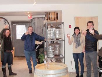Guests of the Blue Barren Distillery tasting event raised a glass of the Eu de Vie blueberry brandy, the distillery’s first product on Friday, March 22, 2019. (Photos by Kay Stephens)