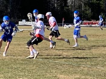 The Camden Hills varsity boys lacrosse team in a game against April 17 against Erskine Academy. (Courtesy Steve Alex)