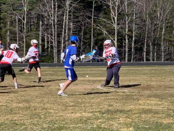 The Camden Hills varsity boys lacrosse team in a game against April 17 against Erskine Academy. (Courtesy Steve Alex)