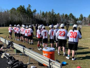 The Camden Hills varsity boys lacrosse team in a game against April 17 against Erskine Academy. (Courtesy Steve Alex)