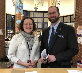 Iris Eichenlaub and Rep. Pluecker in the CHRHS Library. (Photo courtesy Camden Hills Regional High School)