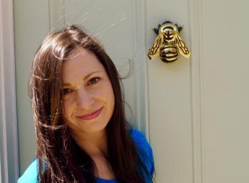 Amanda Amoroso in front of her studio door and its bee knocker. (Courtesy Amanda Amoroso)