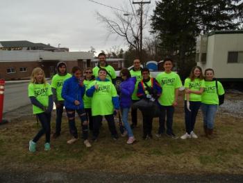 One of the THMS group’s out cleaning poses for a picture May 2. (photo by Erica Thoms)
