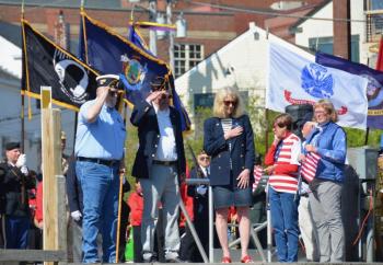 Tossing the commemorative wreath into Camden Harbor. (Photo by Lynda Clancy)