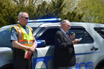 Rockport Police Officer Travis Ford and Rev. Ralph Miller, of Rockport, who addresses the gatherings in Rockport on Memorial Day. (Photo by Lynda Clancy)