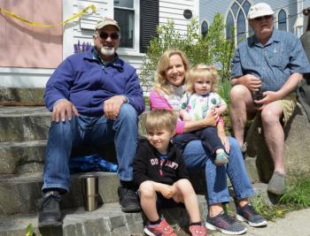 Eric Tolman, 300 years of family history in West Rockport, Monica Pendleton Tolman, Islesboro, 350 years; Ben and Isabel Tolman, 14th generation Isleboro children, their family’s roots there since 1750; and David Dickey, maybe a little more than 100 years in Camden (newcomer) — all observing the Camden Memorial Day Parade. (Photo by Lynda Clancy)