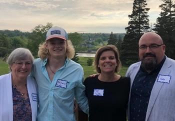 SGBA Scholarship Administrator Rosemary Limmen (left) and SGBA Board Vice President Jake Miller (right) introduced SGBA’s 2019 scholarship winner and Oceanside High School graduate, Zach Cody, and his mom, Tamara Cody (center), to SGBA members at the organization’s after-hours networking event at Blueberry Cove Camp in Tenants Harbor on Tuesday evening, June 18. (Photo courtesy St. George Business Alliance)