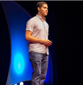 Kaylo Littlejohn speaking at a TEDx event. (Photo by TEDx Youth @ CEHS)