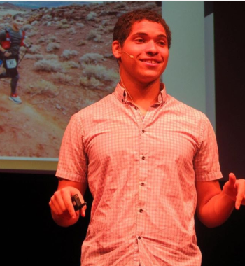 Kaylo Littlejohn speaking at a TEDx event. (Photo by TEDx Youth @ CEHS)