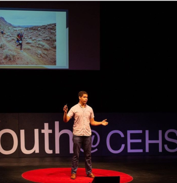Kaylo Littlejohn speaking at a TEDx event. (Photo by TEDx Youth @ CEHS)