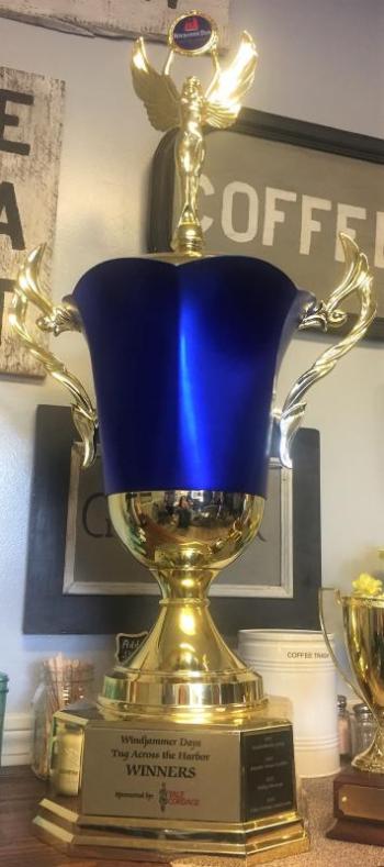 Clear Stream Construction, winners of the 2018 Tug Across the Harbor, recently returned the Loving Cup for 2019’s winning team. LISA KRISTOFF/Boothbay Register