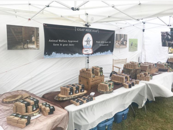 The Copper Tail Farm display at a farmer’s market. (Courtesy Jon and Christelle Mckee)