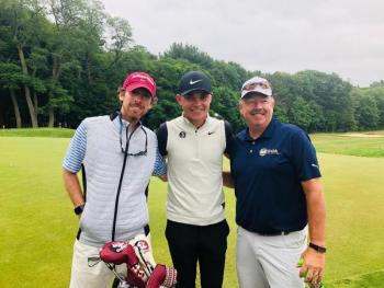 Cole with caddie and Goose River Golf Club pro Alex Plummer and Jeff Seavey, instructor and Samoset Resort assistant golf professional.