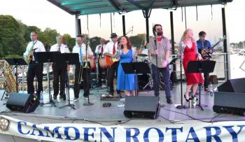 The Right Track gets the crowd warmed up dancing along Camden’s waterfront July 4, 2019. (Photo by Lynda Clancy)