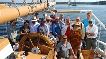 Participating captains gather at the Captain’s Meeting aboard Victory Chimes prior to the 43rd Annual Great Schooner Race. (Photo courtesy Maine Windjammer Association)
