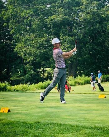 Cole Anderson teeing off on hole #8 for another par. He finished one under for the day, July 10, six under for the tournament.