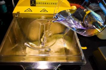 Water is added to the mixer as part of the initial steps to make the pasta. (Courtesy Nick Grim)