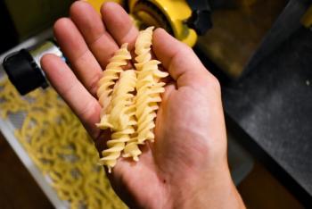 Verifying the pasta is, indeed, ready. (Courtesy Nick Grim)