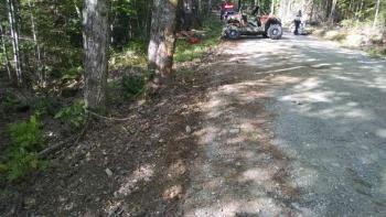An ATV in the background faces perpendicular to Collinstown Road, in Appleton. (Photo courtesy Knox County Sheriff’s Office)
