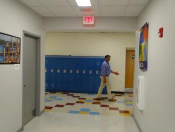 It’s obvious where the new parts of the school intersect with the old, more colorful hallways. (photo by Erica Thoms)