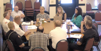 The July 30 workshop concerning Camden’s ambulance service was attended by (left to right)Robert Falciani, Camden Select Board chairman; Audra Caler-Bell, Camden Town Manager; select board members Jenna Lookner, Alison McKellar, and Mark Ratner; Camden Firefighter Matt Heath; Rockland Fire Chief Chris Whytock; Camden Firefighters John Ward and Clint Beveridge; Rockport Fire Chief Jason Peasley; Camden Fire Chief Chris Farley; Camden Select Board member Taylor Benzie; and Rockport Town Manager Bill Post. (Photo courtesy Town of Camden)