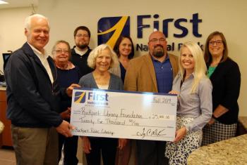 First National Bank presents a donation to the Rockport Library Foundation. L-R: RLF VP John Viehman, RLF Secretary Sarah Rheault, First National Bank’s JB Usher, RLF President Joan Welsh, First National Bank’s Rebecca St. Clair, Jake Miller, Samantha Hill, and Angela Parent. (Photo by First National Bank’s Samantha Glaude)