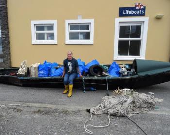 Cleaning up Beginish Island, with Rosemary Hill. (Photo courtesy Rosemary Hill)