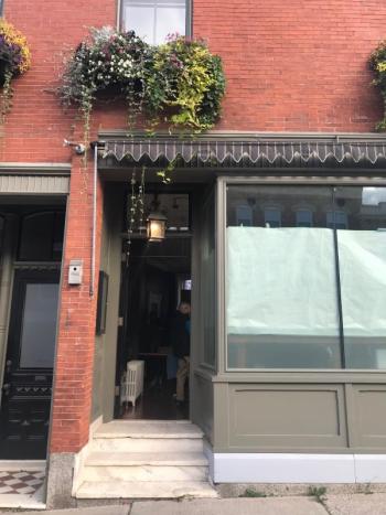 The paper still lined the windows of the Gothic Building on September 18. The building is now the home of sushi restaurant Satori. (Photo by Jenna Lookner)