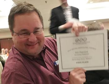 Reporter Bill Pearson holds the first place certificate for his Sports Story. KEVIN BURNHAM/Boothbay Register