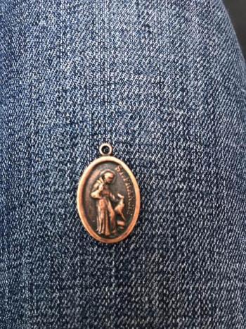 Animals received a St. Francis metal after their individual blessings. (Photo courtesy of Vicki Doudera)