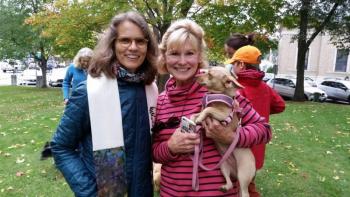 Rev. Dr. Ute S. Molitor of the First Congregational United Church of Christ, Nancy Laite and “Ginger.” (Photo by Sarah Shepherd)