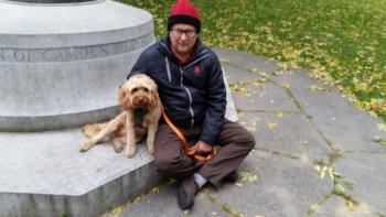 Tillman Crane and his buddy on the Village Green. (Photo by Sarah Shepherd)