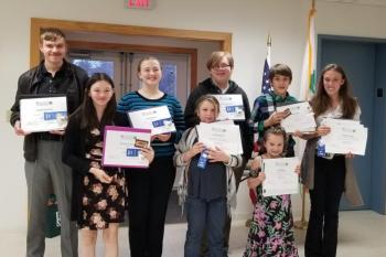The Aldermere Achievers 4-H Club at the Knox-Lincoln 4-H Achievement Celebration (left to right): Jordan Overlock, Britney Jackson, Julia Benson, Isabelle Baker, Anthony Benson, Zoe Baker, Adam Eaton, and Elizabeth Eaton. (Photo by Heidi Baker)
