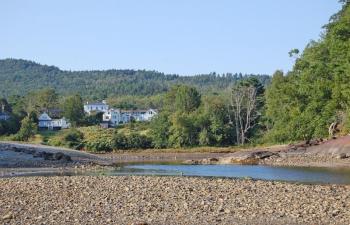 A view of Hop Bay, or Ducktrap River outlet, in Lincolnville. View shows likely landing spot for the Norse expedition, as well as Ducktrap Mountain in background. (Photo courtesy Dennis Cerrotti)