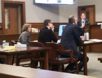 Sharon Carrillo sits in between her defense attorneys. Laura Shaw in on Sharon’s left while Chris MacLean is on her right. All are watching Assistant Attorney General Leane Zainea deliver closing arguments for the State. (photo by Erica Thoms)