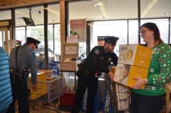 Mariah Singer, Hannaford employee; Rockport Police Officer Tony Del Vecchio and Camden Police Officer Mark Bennett.