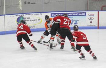 The Camden Hills ice hockey team in its Dec. 28 game against Gardiner. (Courtesy Molly Cole)