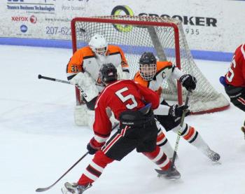 The Camden Hills ice hockey team in its Dec. 28 game against Gardiner. (Courtesy Molly Cole)