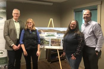 Rock Knowlton, president Maine Water Company; Sarah Demers; Heidi Baker, Land for Maine’s Future; and Ian Stewart, executive director, Coastal Mountains Land Trust. (Photo courtesy Coastal Mountains Land Trust)