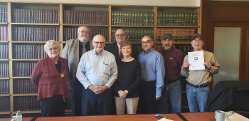 Margaret Jones, Mountainside Community Cooperative board vice president; Richard Leach, board president; Stuart Welch and Margaret Welch, seller; Paul Harding, board secretary; Phil Amoroso, board treasurer; Jeff Jolicoeur, board operations manager; and Ron Stasiowski, board director, at large. (Photo courtesy Mountainside Community Cooperative)