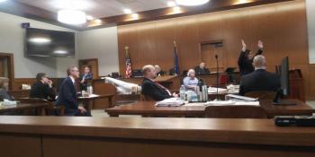 Assistant Attorney General Zainea (second from right) raises her hands while describing a photo of Sharon Carrillo and Marissa Kennedy to jurors during her closing argument. Sharon Carrillo’s attorney Laura Shaw is on the far left, with Sharon Carrillo sitting beside her, who in turn is sitting by attorney Chris MacLean.
(photo by Erica Thoms)
